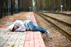 The guy sleeps expecting a train