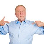 Closeup portrait, senior mature, arrogant, bold, self-important uppity stuck up man with napoleon complex, short man syndrome, isolated white background. Negative emotion facial expression feelings.