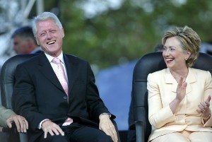 NEW YORK - JUNE 25: Former U.S. President Bill Clinton (L) and his wife, U.S. Senator Hillary Clinton (D-NY), laugh at the Greater New York Billy Graham Crusade June 25, 2005 in Flushing, New York.